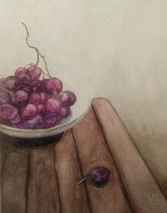 Uvas en un cuenco sobre una mesa de madera, dibujo en acuarela.